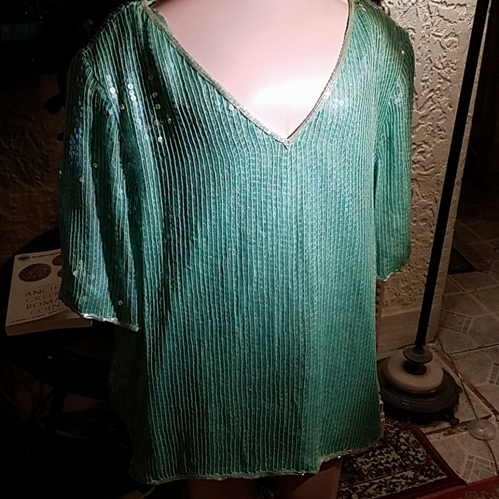 Showstopping turquoise silk and sequins top